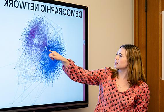 Image of Gabrielle Knapp '26 presenting her research at the Marist Poll.